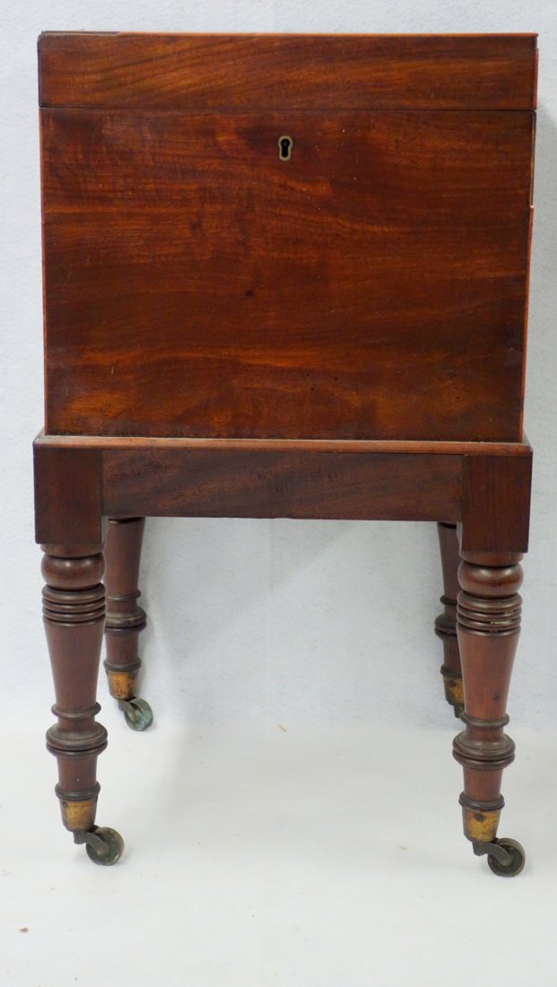 Sheraton mahogany cellaret with a fitted interior - 24: Sheraton mahogany cellaret with a fitted interior - 24 3/4"H x 14 1/4/" x 13"D. Minor veneer losses and inlay at the corners otherwise good condition. Provenance: Sam and Grayson Hall. Sam Hall (1921-