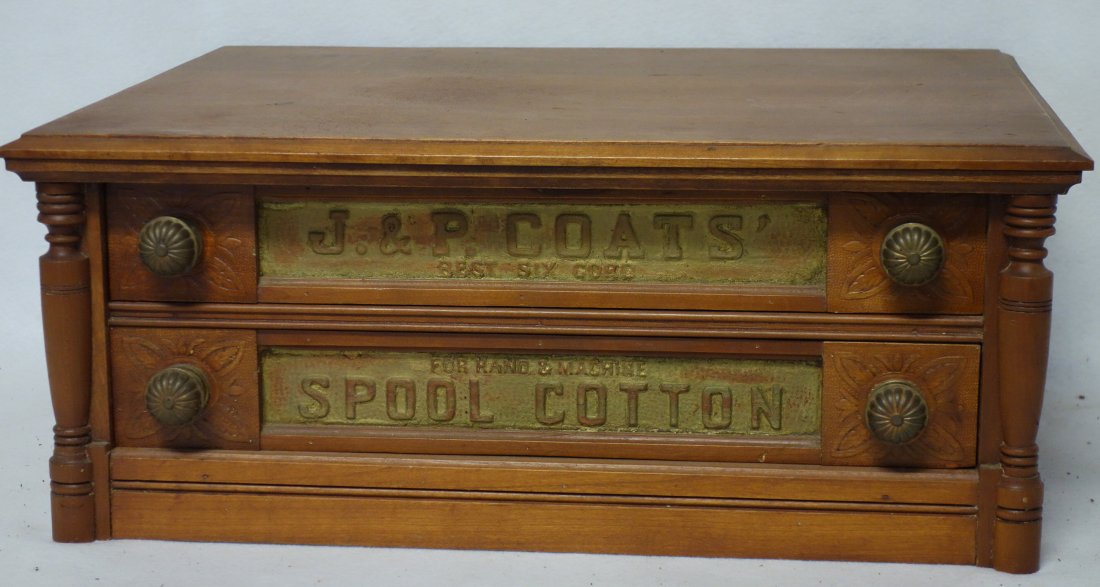 J. P. Coats two drawer spool cabinet. 9"H x 21 1/2"L x: J. P. Coats two drawer spool cabinet. 9"H x 21 1/2"L x 16 3/4"D. Good condition.
