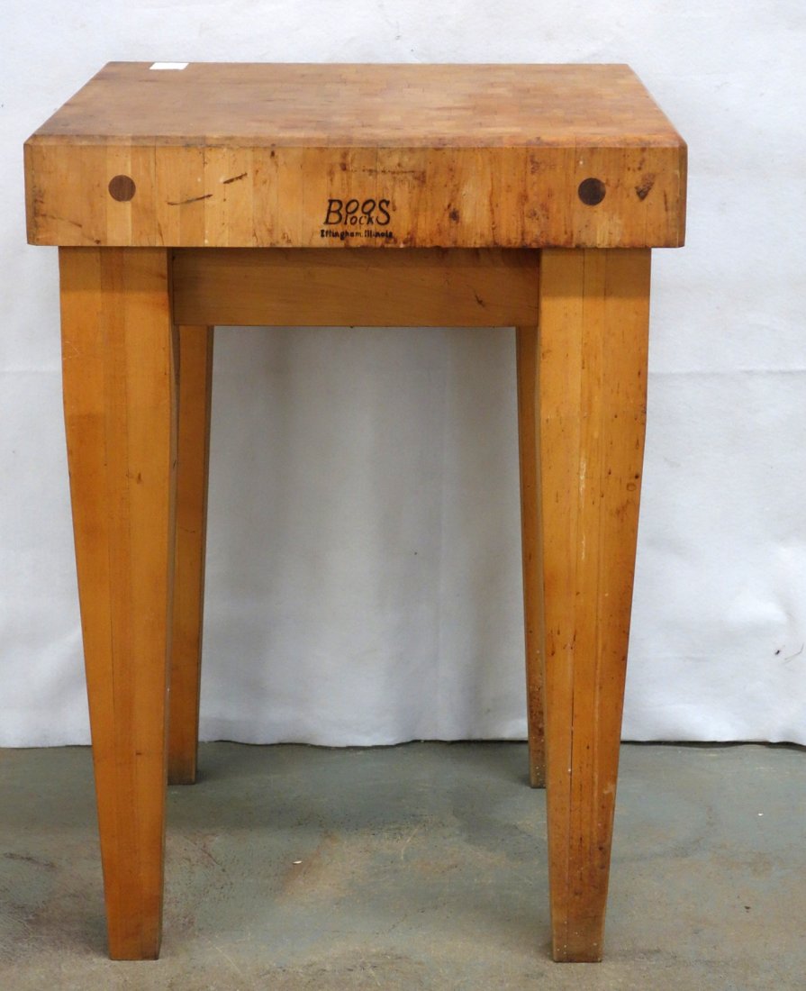 Butcher block table manufactured by Boos Blocks: Butcher block table manufactured by Boos Blocks Effingham Illinois - 34"H x 24"W x 24"D. 20th century. Good condition. Provenance: Sam and Grayson Hall. Sam Hall (1921-2014) : Noted screen writer, par