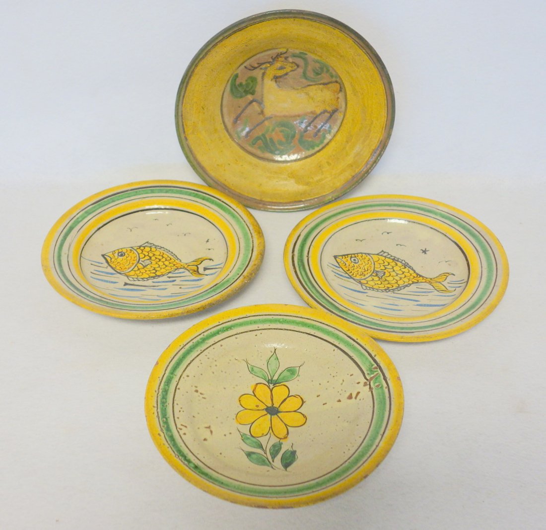 Four redware bowls three decorated with fish, the forth: Four redware bowls three decorated with fish, the forth with a deer. 20th century. 9" Dia. some minor glaze chips. See pictures for further information. Provenance: From the Tudor estate, Boston Mass.