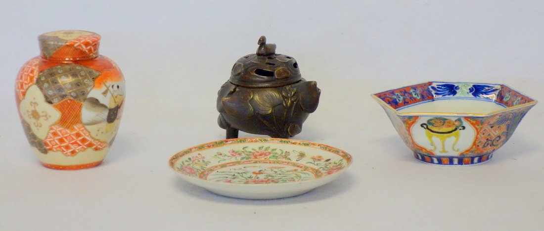 Grouping of four early Oriental objects including a: Grouping of four early Oriental objects including a bronze incense burner with a duck finial and leaf decoration, 4 1/4"h; a covered jar, 4 3/4"H; a hexagonal bowl, 5 1/4"Dia; and a rose medallion pla