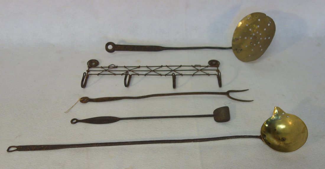 Five pieces of early iron kitchen utensils including (1 of 3)