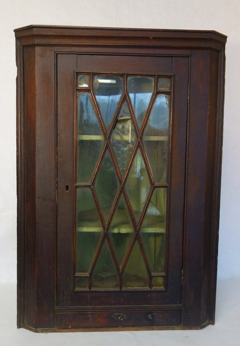Early wall hanging corner cupboard having a single (1 of 5)