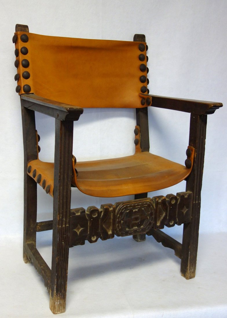 Early oversized southwestern arm chair with newer: Early oversized southwestern arm chair with newer leather seat and back - original hand forged tacks - see-through mortised construction. Probably 17th/18th century. Expected wear to bottom of feet, i