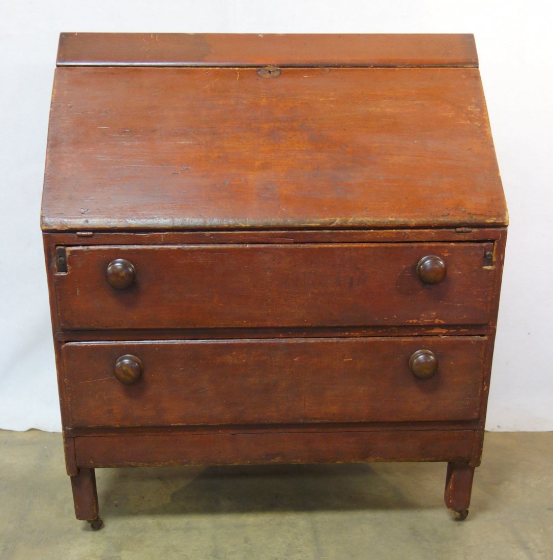 Country pine slant front desk in old red stain having (1 of 5)