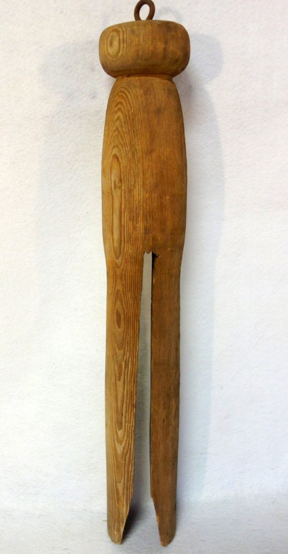 Old clothes pin trade sign, possibly for a laundry, (1 of 4)