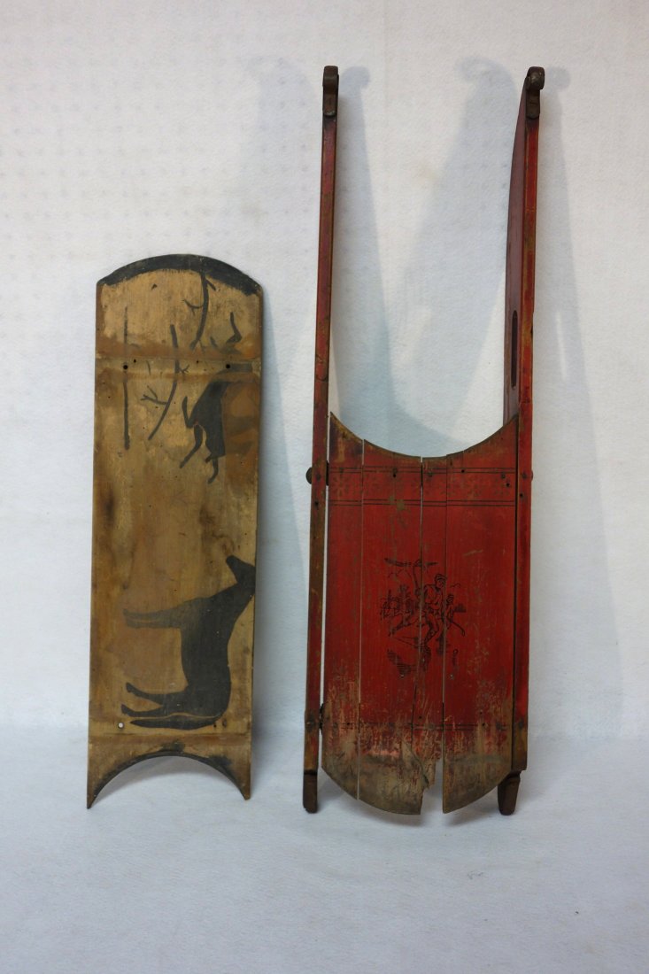 Child's red painted sled with stenciled hockey players (1 of 8)