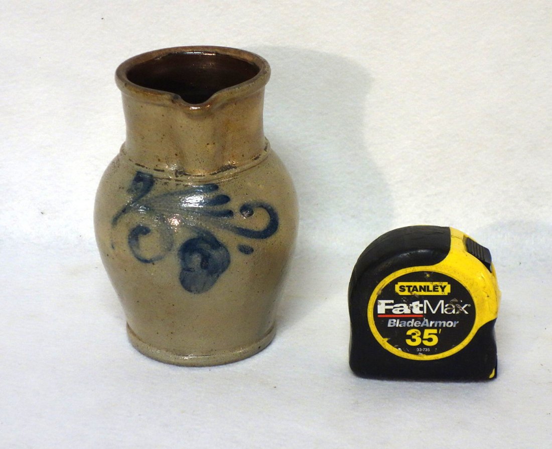 Small Stoneware pitcher, probably quart size, with (1 of 5)