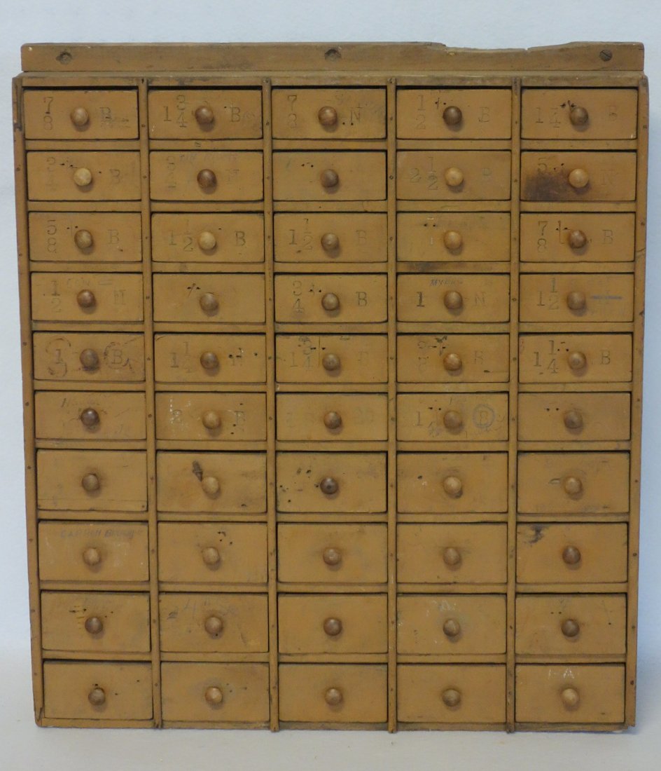 Early country store hardware cabinet having 50 small (1 of 4)