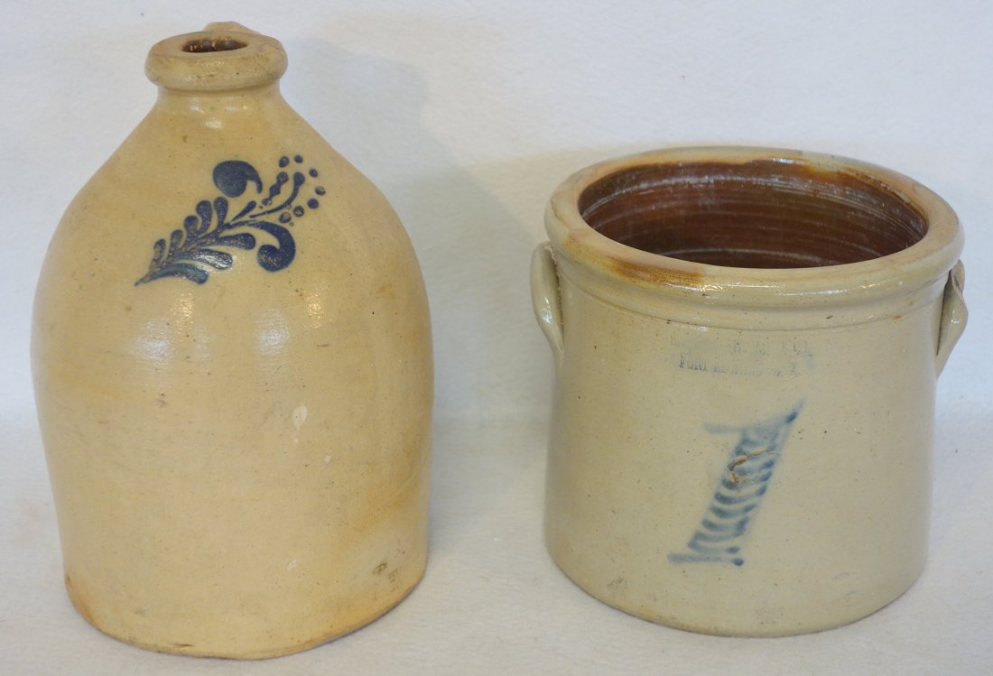 Two stoneware crocks including 1 gallon with large hand (1 of 2)