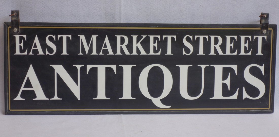 East Market Street Antiques" custom made sign in black: East Market Street Antiques" custom made sign in black and white color. 20th century. 36"L x 12"H. This was Susie's sign used on her store in Red Hook NY. Provenance: From the Sandra Mackintosh-Buhali