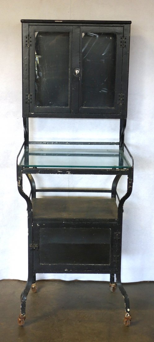 Medical cabinet having 2 glass doors over glass shelf (1 of 2)