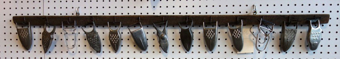 Collection of 13 grater/peelers, early to mid 20th (1 of 4)