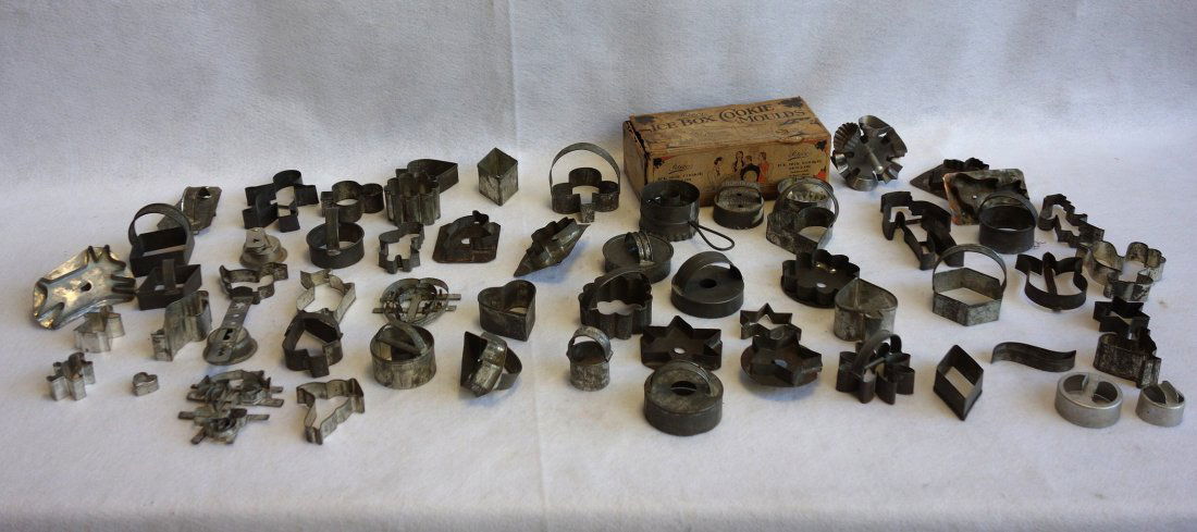 Large grouping of toleware cookie molds including (1 of 5)