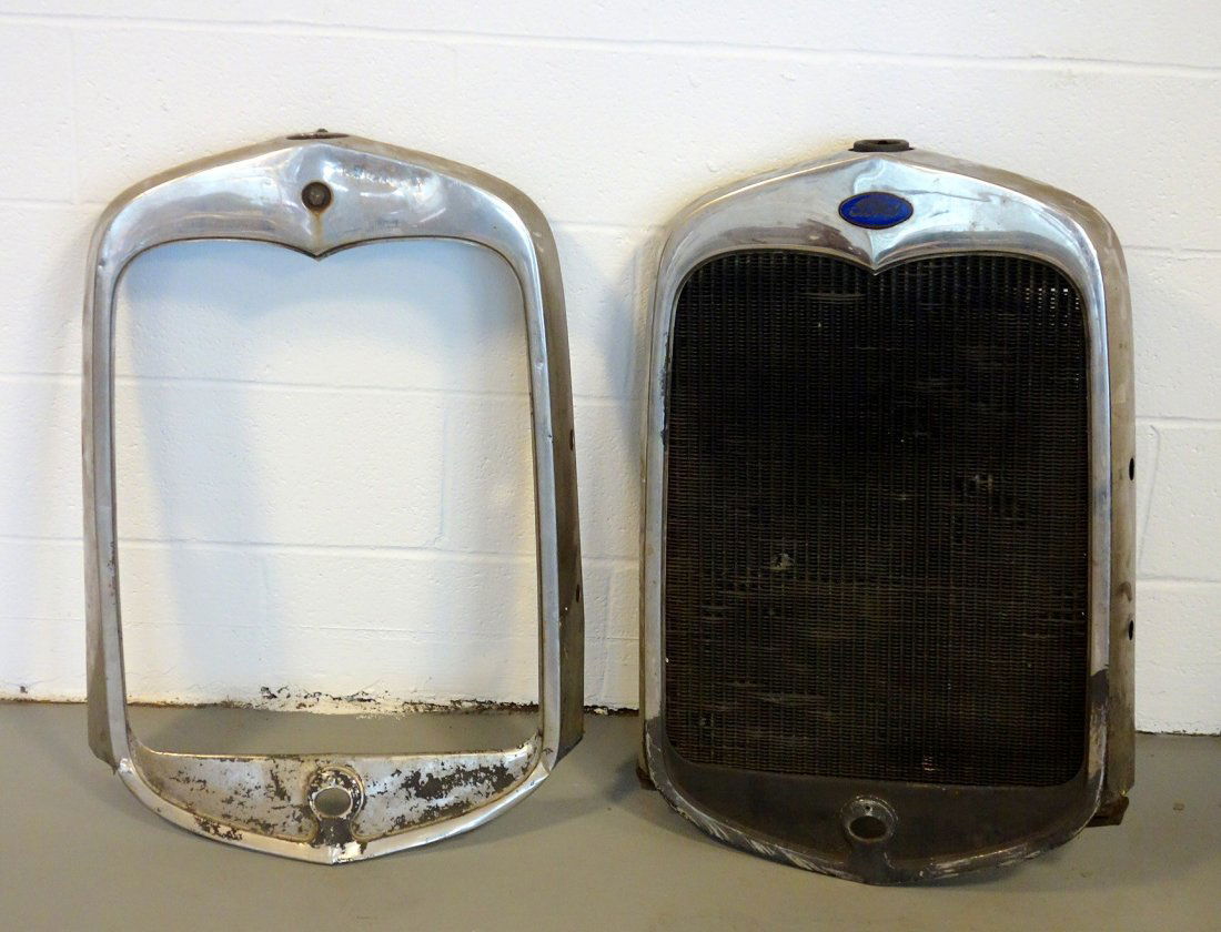 Grouping of two Ford radiator surrounds including one (1 of 3)