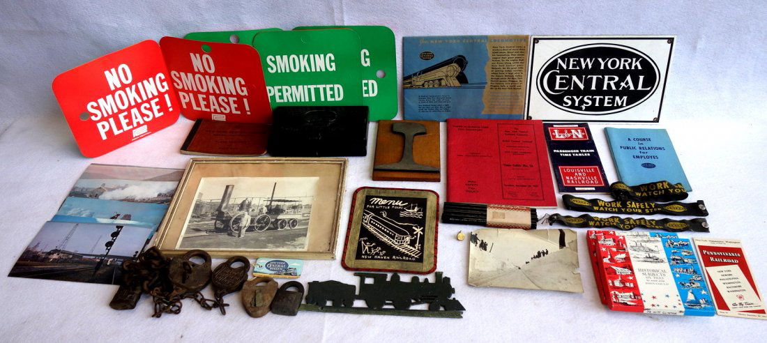 Grouping of railroad items mostly New York Central: Grouping of railroad items mostly New York Central System including, books, time tables, first aid kit box, work safely arm bands, signs, photos, railroad locks, etc.