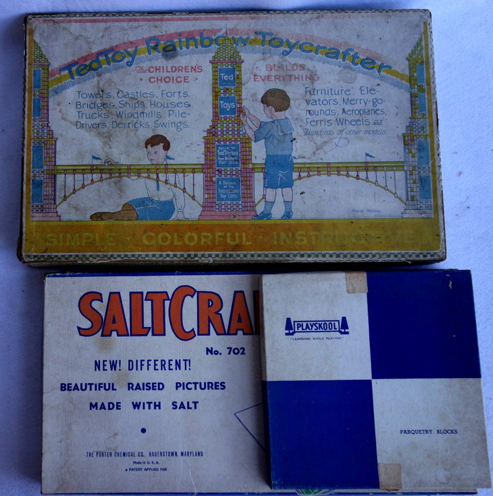 Three children's craft toys in original boxes: Three children's craft toys in original boxes including: Playskool Parquetry Blocks, Saltcraft No. 702, and Ted Toy Rainbow Toycrafter. All very good condition and appear to be complete.
