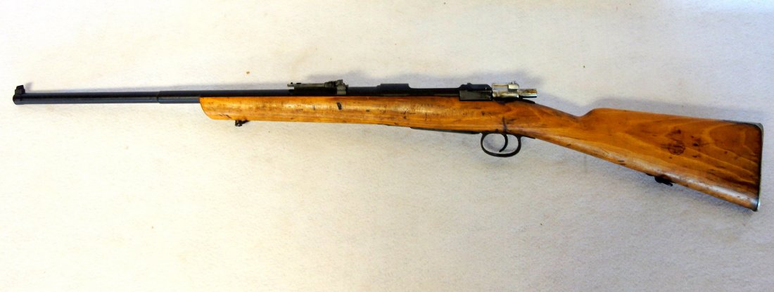 Spanish Mauser high power bolt action rifle marked: Spanish Mauser high power bolt action rifle marked below barrel "Fabrica Le Armus" & "Oviedo 1898". Barrel Length 23.75". Serial number on rifle E7445 and on stock marked 7557. Note stock has been ref