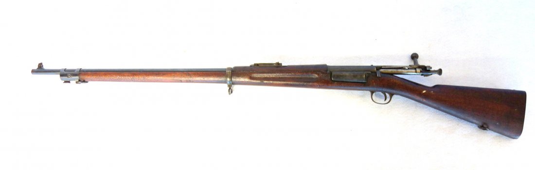 US Springfield Model 1898 Krag bolt action rifle - left: US Springfield Model 1898 Krag bolt action rifle - left side of receiver marked "US Model 1898. Springfield Armory 449358". Stock has a heavy alligatored original surface, and excellent 95% bluing on