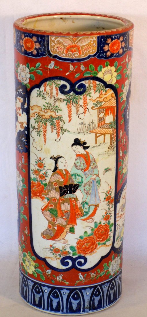 Oriental umbrella stand having hand painted medallions: Oriental umbrella stand having hand painted medallions with people surrounded by floral and bird decorations. Probably mid 19th century. Extensive cracks and repairs, but no losses. 24"H x 10"D.