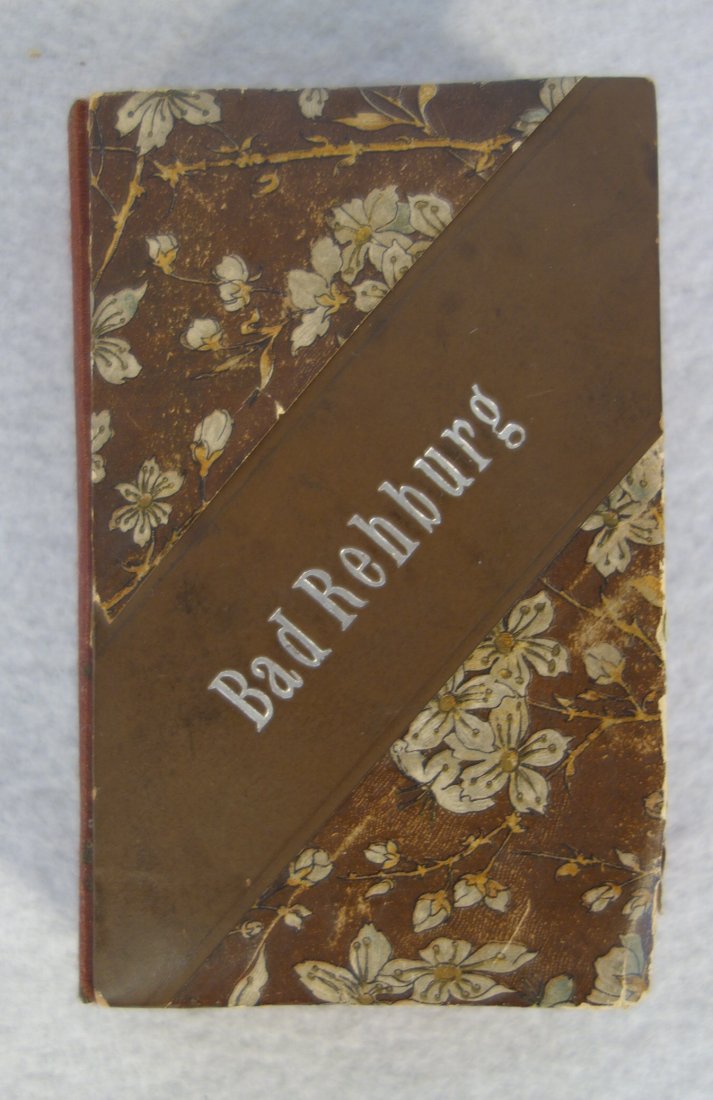 Charming German child's 19th century miniature hand: Charming German child's 19th century miniature hand book filled with classroom writings and drawings including fireman holding ladder, map, puzzles, etc. Cover signed "Bad Rehburg" - first page marked