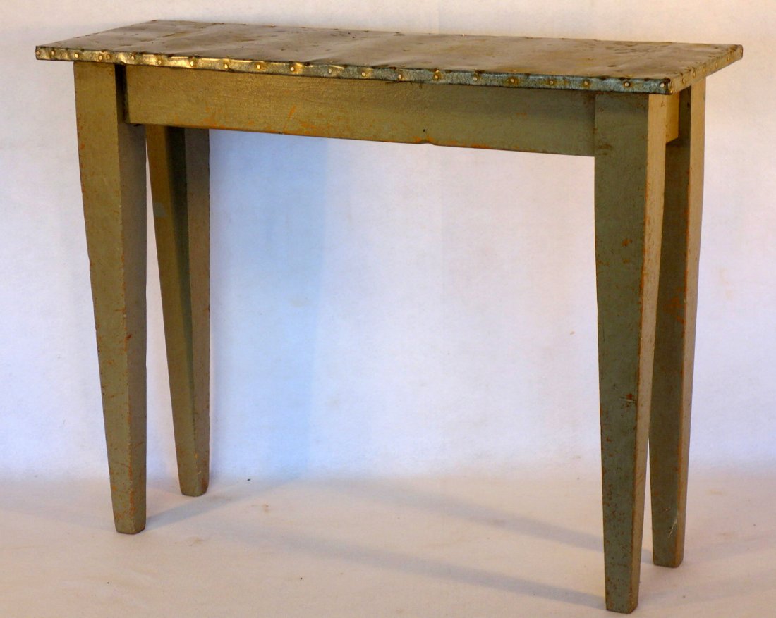 Small zinc top work table with heavy tapered legs, mid: Small zinc top work table with heavy tapered legs, mid 20th century. 36"L x 12"W x 28.5"H. Good condition.