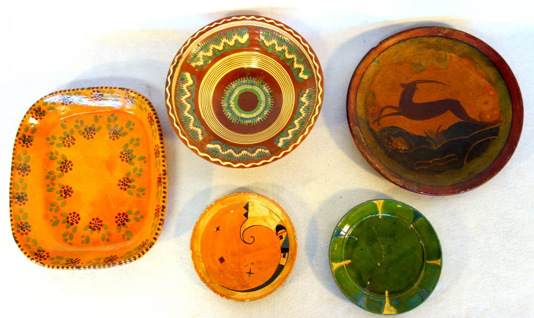 Grouping of pottery including paint decorated redware: Grouping of pottery including paint decorated redware platter - 14.75" x 12.5" - 20th century, Native American decorated paper mache plate - 8.5"D, green glazed plate signed Exposition 1900 - 9"D, Rus