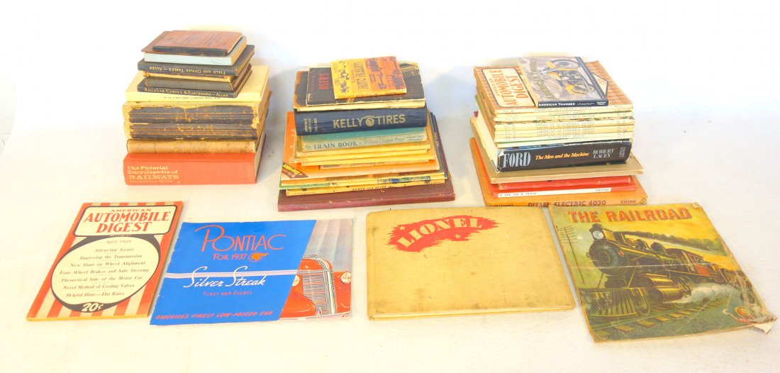 Two boxes of auto and train related books and booklet.: Two boxes of auto and train related books and booklet. Includes Auto Blue Book 1921, 3 Railroad Trainmen's Journals 1905, 1919 Associated Tours Guide, Automobile Racing 1939, Power and Speed 1944, etc