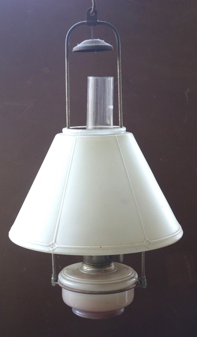 Original signed Aladdin oill lamp ceiling fixture: Signed Aladdin hanging country store fixture, late 19th century, with original frosted glass shade & matching oil lamp, original Aladdin chimney and tin smoke bell. Some losses to chrome on metal fram