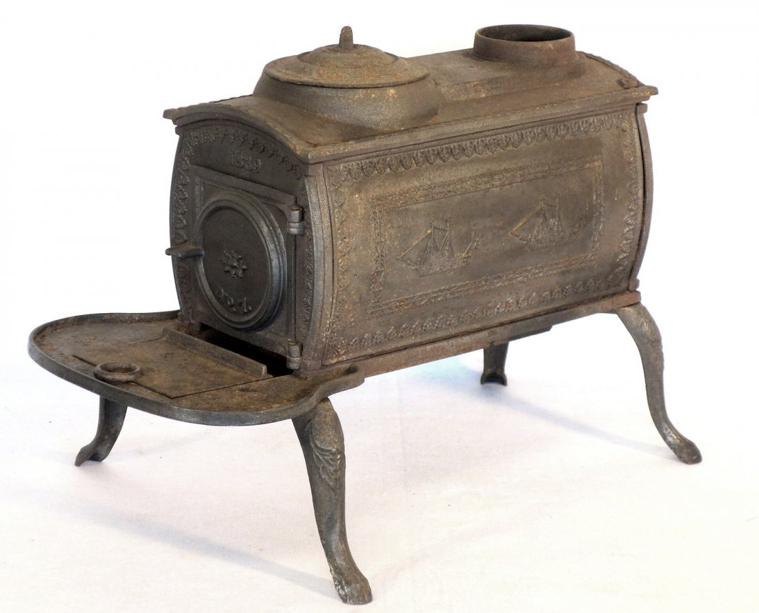 Early cast iron parlor stove by the Tyson Furnace, (1 of 4)