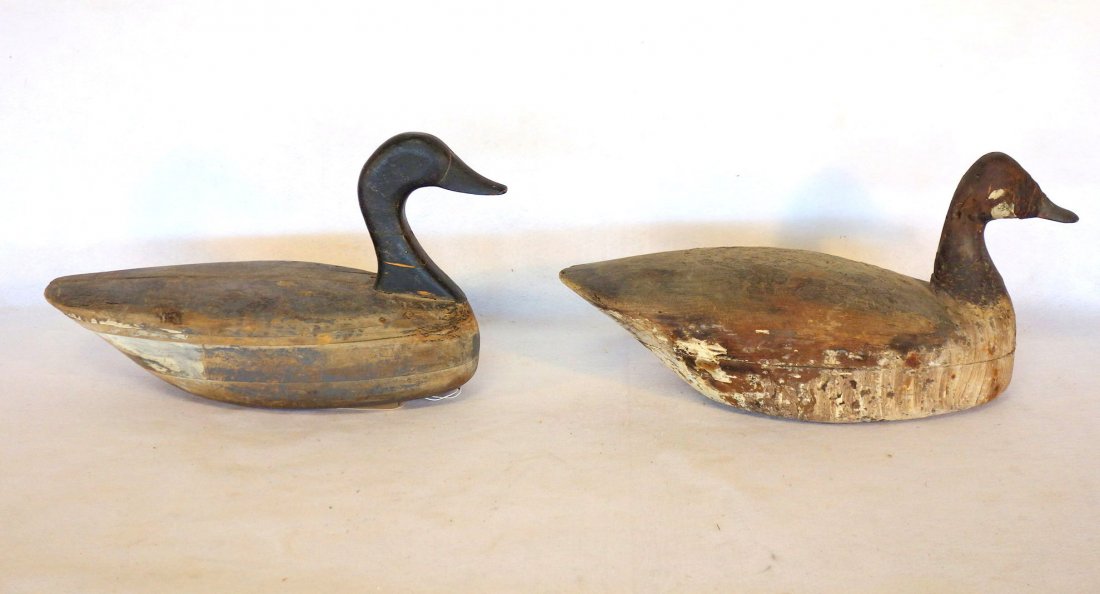 Two primitive Canadian goose decoys, one with repairs (1 of 4)