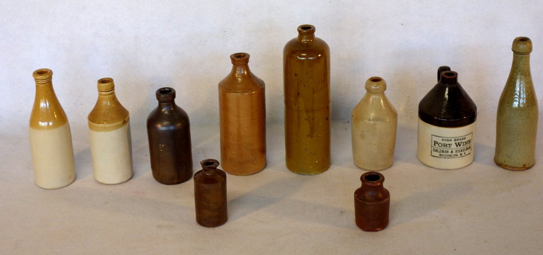 Grouping of 9 small stoneware articles including beer &: Grouping of 9 small stoneware articles including beer & soda bottles - one small size beer bottle 6.75"H signed E. Hubbard, 2 brown glazed ink bottles, and Salzman & Siegelman Brooklyn NY Port Wine bo