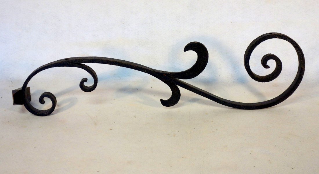 Architectural hand forged metal decorative object in (1 of 3)