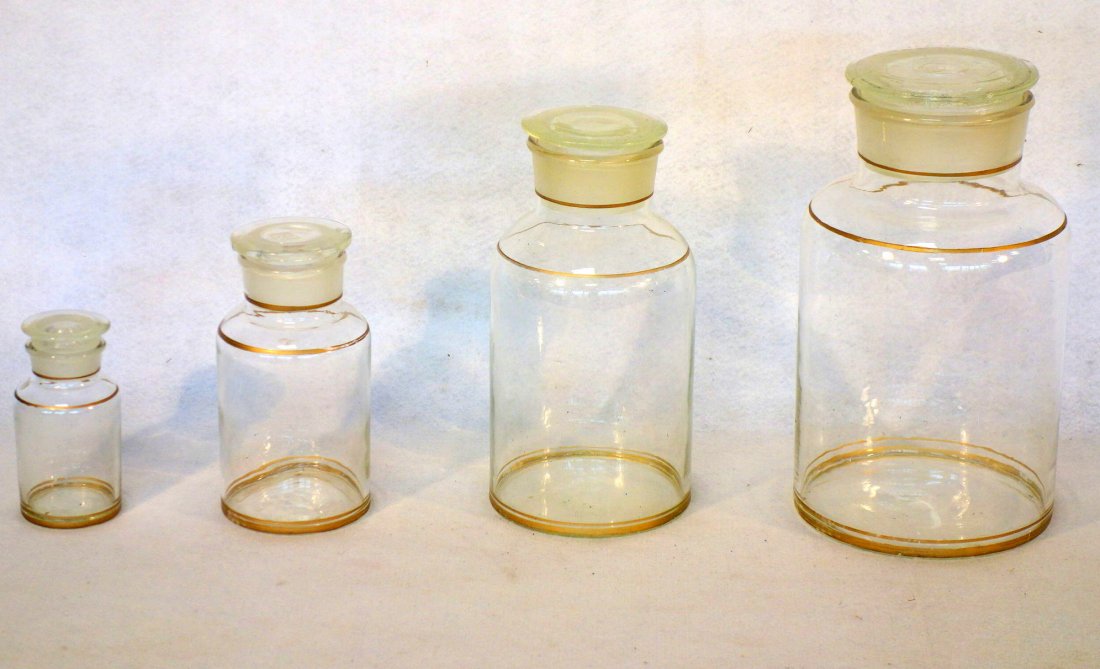 Grouping of 4 apothecary jars in graduated sizes - (1 of 2)