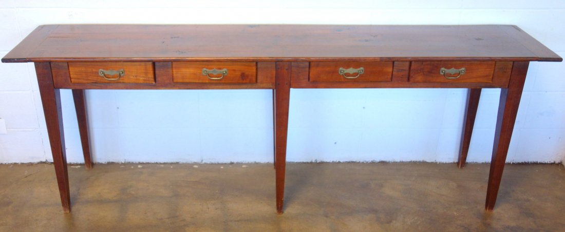 Long pine custom made work or sofa table with 4 drawers: Long pine custom made work or sofa table with 4 drawers and 6 tapered legs, all pegged into apron - top having breadboard ends - very good condition, mid to late 20th century. 86.5"L x 17.25"D x 30"H.