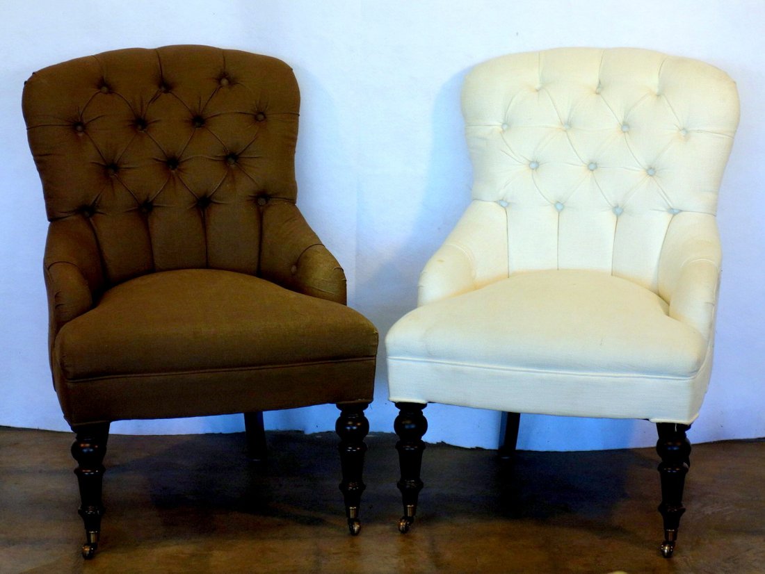 Two Victorian style upholstered parlor chairs with: Two Victorian style upholstered parlor chairs with turned wooden legs signed Mitchell Gold & Bob Williams, North Carolina. Minor stains, overall very good condition. Late 20th century.