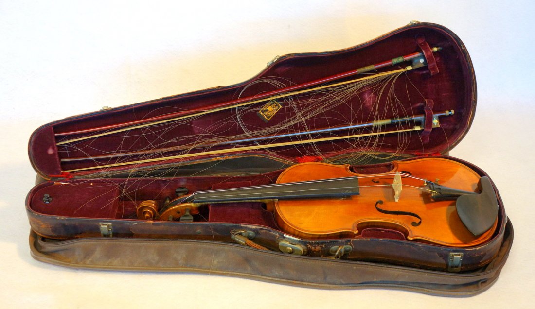 Straduari tiger maple violin with 2 bows.: Straduari Tiger maple violin, two bows and hard and soft cases. The violin is stamped on the back of the scroll above the neck "Artist Violin / Straduari". Also has a paper label in the belly " Antoni
