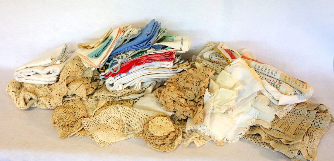 Large lot of 2 boxes of old mostly hand sewn linens and: Large lot of 2 boxes of old mostly hand sewn linens and crocheted textiles. Most in very good condition.
