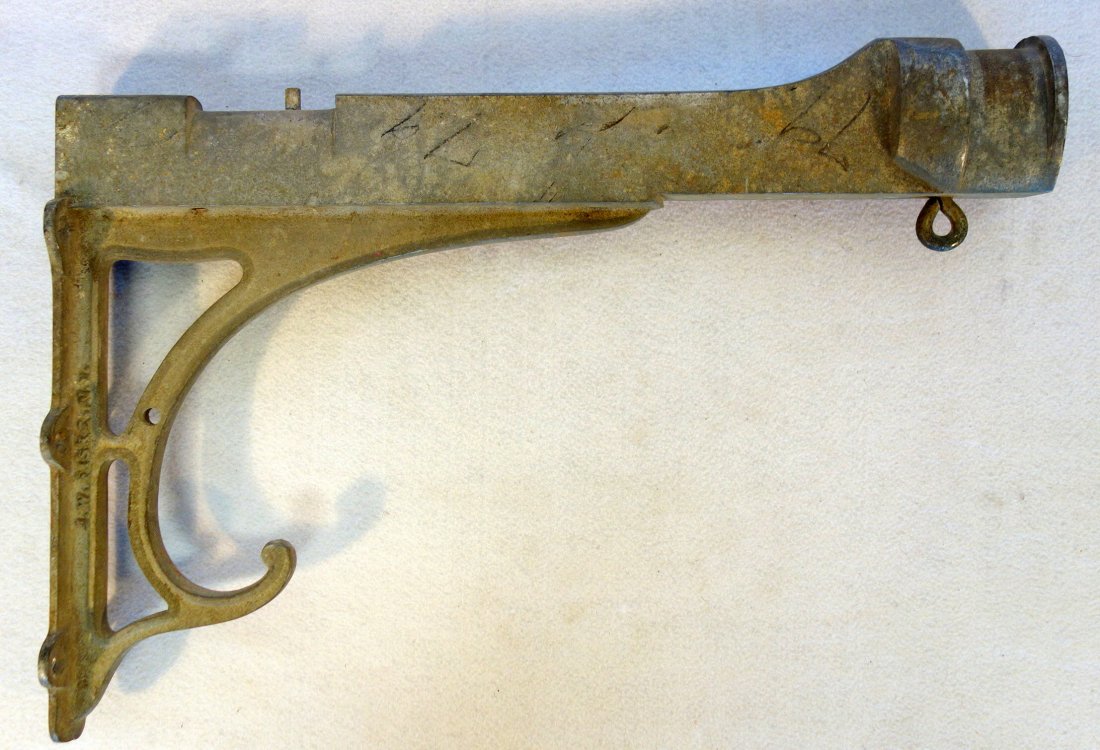 Old cast zinc saddle or sign holder signed J.W. Fiske: Old cast zinc saddle or sign holder signed J.W. Fiske NY. 24"L x 16"H. Very good condition. Shield applied to front marked 156th F.A. / 25. Probably the US Army 156th Field Artillery unit, 19th centur