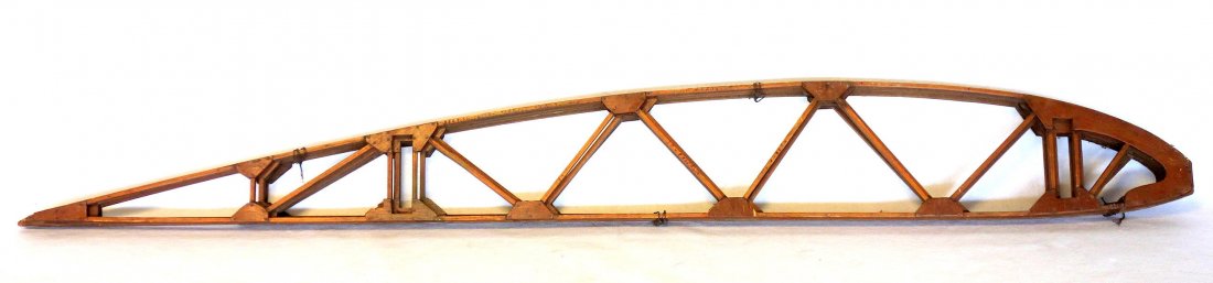 Group of 4 hand made wooden frames possibly for a: Group of 4 hand made wooden frames possibly for a transportation model or architectural structure. The longest being 65.5"L. Early 20th century. Good condition