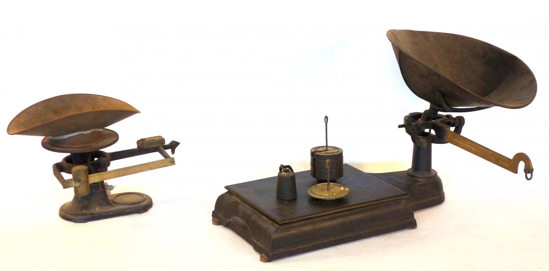 Two cast iron country store scales including a grain: Two cast iron country store scales including a grain platform scale signed Fairbanks & Co. - 22"L and a smaller 13.5"L balance scale, not signed. Both in good condition, late 19th century.