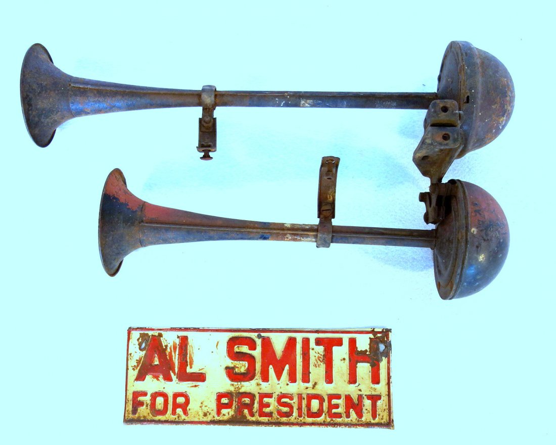 Old double auto horn with traces of original paint -: Old double auto horn with traces of original paint - 21.5"L - some service rust otherwise good condition; sold with an "Al Smith For President" license plate - all original - several dings, surface sc