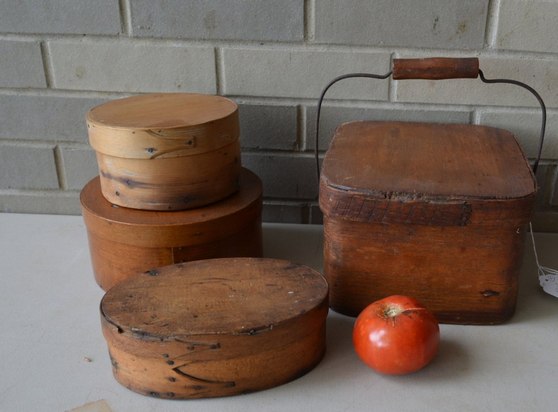 Four assorted early wooden pantry boxes ranging in size: Four assorted early wooden pantry boxes ranging in size from 6.25"D to 8.75"D - most in good condition. 19th century.