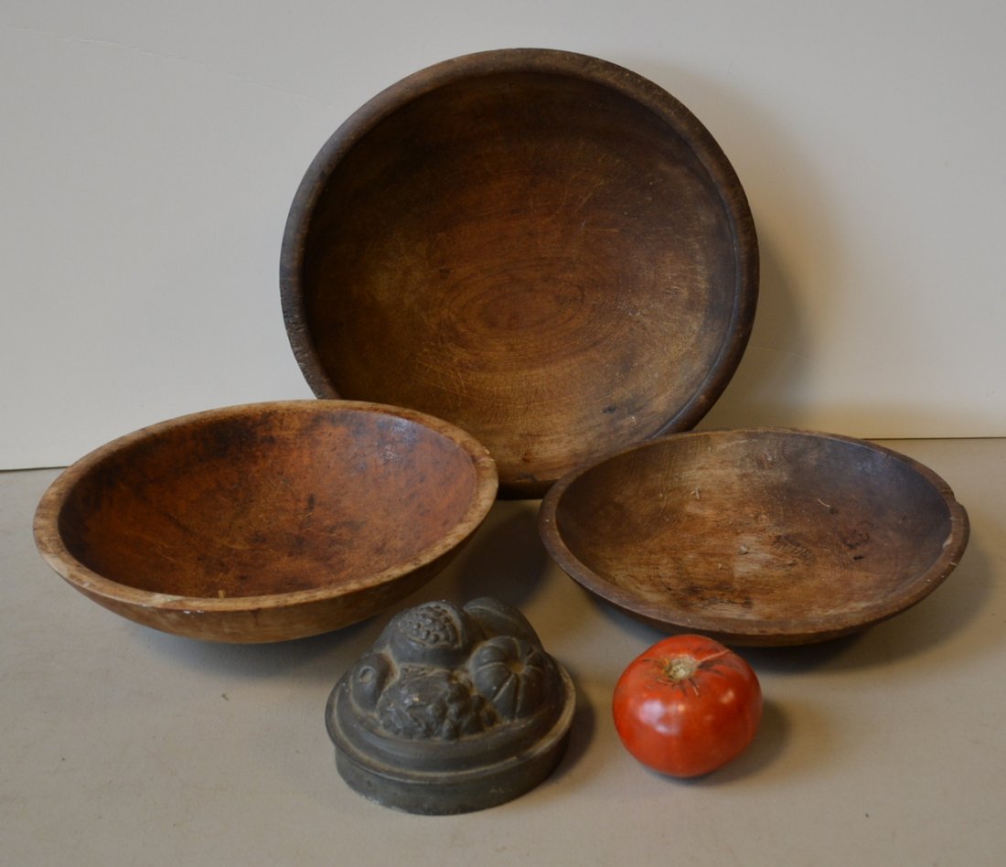 Grouping of 7 country items including 3 treenware bowls: Grouping of 7 country items including 3 treenware bowls ranging in size from 10.5"D to 12.25"D - 19th century, 3 French copper pots with lids, and a top to an early pewter ice-cream mold signed Cunsle