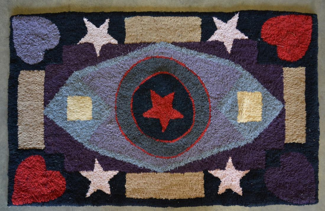 Hooked rug decorated with stars & geometric designs, (1 of 4)