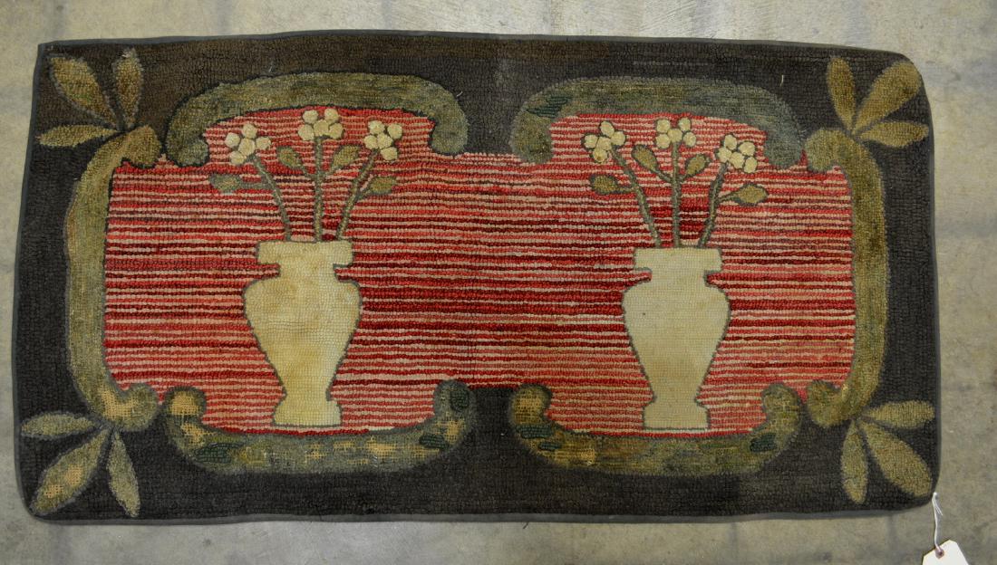 Graphic hooked rug depicting 2 large vases containing (1 of 7)