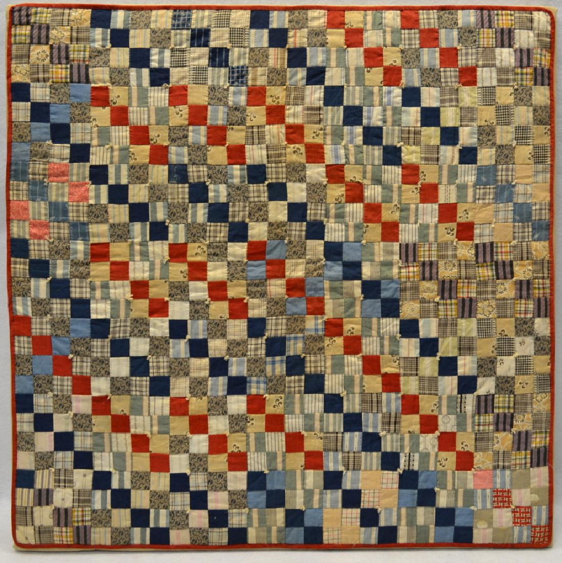 Crib quilt in postage stamp pattern - 28.5" square. (1 of 2)