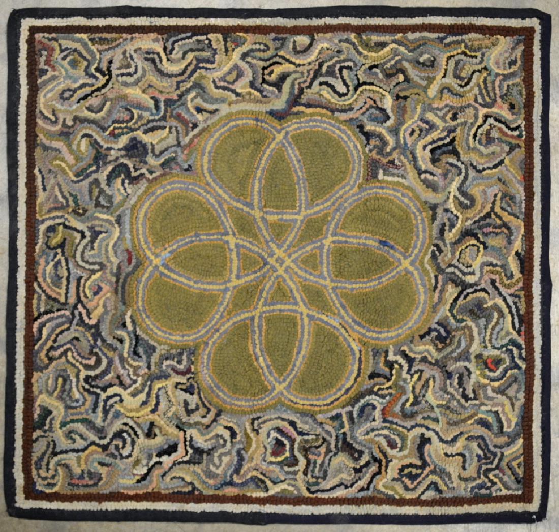 Hooked rug - center decorated with interlocking loops. (1 of 4)