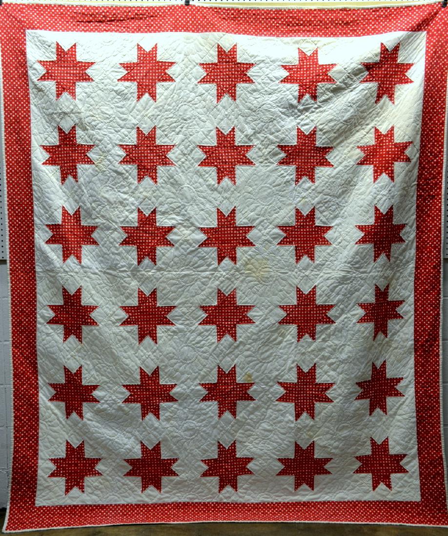 Patchwork patriotic quilt with red stars on a white (1 of 7)