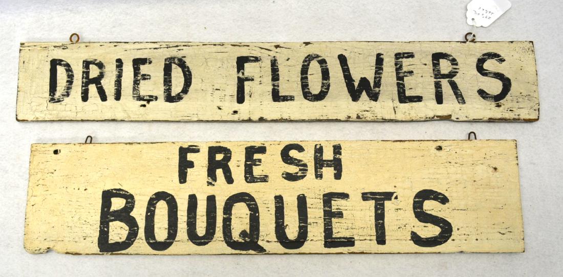 Two roadside flower signs in original paint including: Two roadside flower signs in original paint including "FRESH BOUQUETS" and "DRIED FLOWERS" - Original black and white paint - 29"L & 26.5"L.